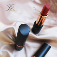 Tube de rouge à lèvres rond de couleur balle rouge brillant noir et or de luxe de marque privée unique