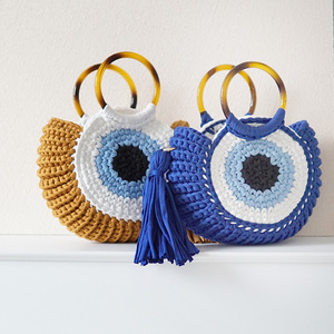 Bolsos de Mano de Playa para Mujer de <span class=keywords><strong>Moda</strong></span> 2025 con Ojo del Diablo Hechos a Mano en Lana de Ganchillo con Borlas y Logo Impreso - Product Image 1