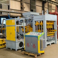 Machine de production automatique de briques en ciment QT8-15 avec système de contrôle PLC