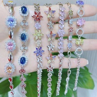 Bracelet en cuivre plaqué or en gros, serti de micro-diamants VVS Zircon, style Ice Out, avec breloque œil baguette pour femme