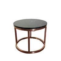 Table basse en acier inoxydable rose gold avec plateau en marbre noir rond