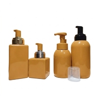 Récipient cosmétique de forme carrée bouteilles en plastique colorées de mousse de savon liquide de lavage de main bouteille de lotion pour le corps avec la pompe pour le shampooing