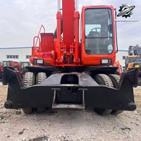 Vente Flash : Excavatrice sur pneus Doosan DH210 d'occasion, 21 tonnes, système hydraulique complet, bon état, livraison rapide, expédition mondiale