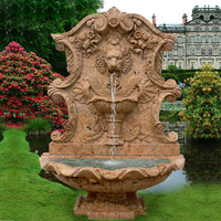 Fontaine murale élégante en pierre beige antique avec cascade