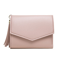 Porte-monnaie élégant à pompon, nouvelle collection 2025, tendance, porte-cartes, pochette courte pour billets et pièces