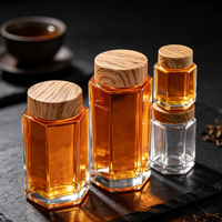 Vente en gros usine : Bouteilles de miel hexagonales avec couvercle imitation bois, Bouteilles en verre, Bocaux scellés, Bocaux à confiture et Bouteilles pour conserves