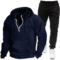 Nouvel ensemble sportif décontracté pour homme : sweat à capuche demi-zippé à motif gaufré et pantalon noir