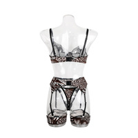 Ensemble de lingerie 3 pièces en maille ajourée transparente effet peau de serpent pour la vente en gros