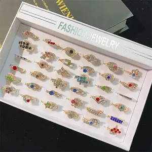 Agosto mezclados, a granel de aleación de seguro color anillo de diamantes de imitación de moda salvaje chapado en oro de color barato venta al por mayor anillo