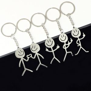 Porte-clés mignon en acier inoxydable en forme de couple avec dessin simple pour visage, pendentif mousqueton en forme de personnage - Product Image 1