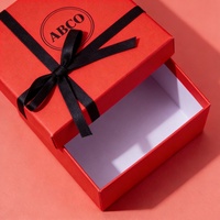 Boîte rigide de luxe avec logo gaufré en feuille d'or, emballage cadeau avec nœud en ruban, boîte avec couvercle et base, boîte de marque