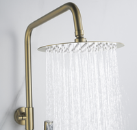 Nouvel ensemble de douche de pluie thermostatique ronde de salle de bain complète fixée au mur exposée en or brossé avec douchette