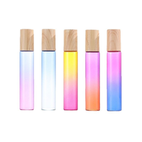 Flacon en verre dégradé/transparent de 5 ml et 10 ml avec bille en acier et couvercle noir/à motif bois pour l'emballage d'huiles essentielles/parfums