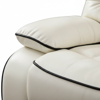 Ensemble de canapés inclinables Chesterfield en cuir tufté, design moderne haut de gamme, pour une décoration élégante de salon.