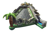 Structure gonflable commerciale à thème Volcan et Jungle avec toboggan, en PVC robuste, pour enfants, idéale pour les jeux de rebond, les événements extérieurs et la location.