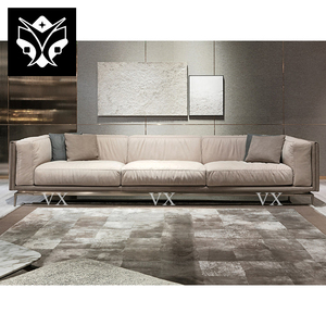 Canapé d'angle extensible en forme de L de style italien moderne, design <span class=keywords><strong>royal</strong></span> de luxe, avec rembourrage en éponge et revêtement en tissu capitonné pour salon - Product Image 1