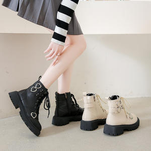 Mode croix-sangle couleur unie <span class=keywords><strong>bottes</strong></span> à lacets 2023 femmes Design amour bouton semelle épaisse Doc <span class=keywords><strong>bottes</strong></span> western cowboy <span class=keywords><strong>bottes</strong></span> - Product Image 5