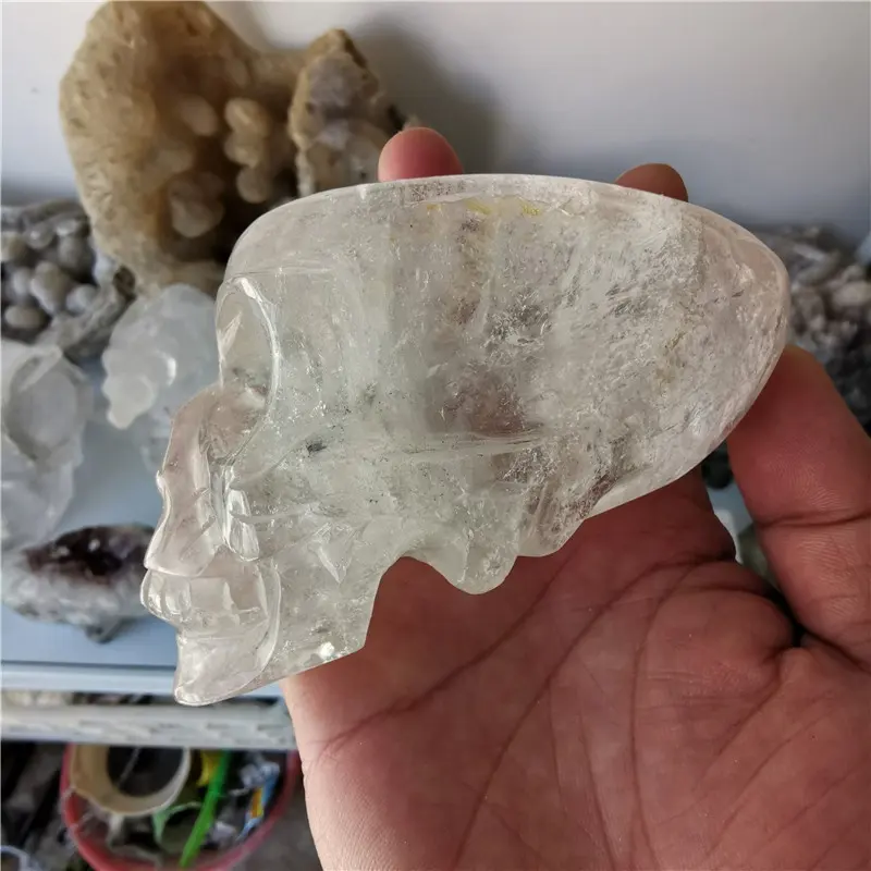 Venta al por mayor piedra natural tallada a mano de cristal de cuarzo curación alienígena cráneos para venta