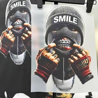 DTF personnalisé (directement sur tissu) Plastisol impression par transfert de chaleur matériau PET autocollant en fer pour chemises sacs chapeaux transferts de presse