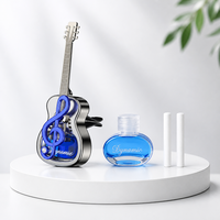 Clip diffuseur de parfum pour voiture en forme de guitare, aromathérapie aux huiles essentielles, déco pour mélomanes