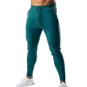 กางเกงกีฬา Jogger สำหรับผู้ชาย,กางเกงออกกำลังกายผ้าฝ้าย90% สแปนเด็กซ์10% - Product Image 1