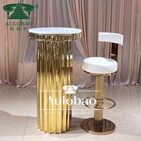 Table et chaises de bar rondes modernes en acier inoxydable avec design en fil métallique pour usage en club et commercial