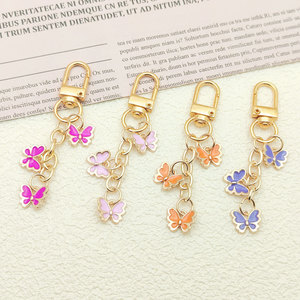 Creative DIY Metal Keychain Pendant New Ins Colorful Butterfly Oil Drop Earphone Case Bag Decoration Cartoon Style - Product Image 1