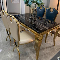 Luxuriöses Nordisches Marmor-Esstisch- und Stuhl-Set mit Edelstahl-Goldbeschichtung für Zuhause & Restaurant