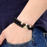 ZF Lot de 2 bracelets classiques extensibles en pierre naturelle noire pour homme, style punk, avec breloques zircon CZ, boule, crâne et lion, ensemble de bijoux