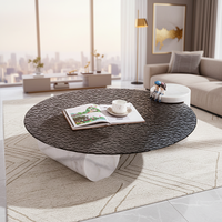 Table basse ronde en verre trempé à texture d'eau ondulée noire de luxe moderne avec pieds en colonne de marbre pour salon