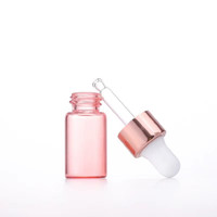 Bouteille de compte-gouttes de sérum Rose à huile ronde en verre 1ml 2ml 3ml 5ml bouteille de compte-gouttes oculaire en or Rose bouteille de compte-gouttes Rose pour les cosmétiques