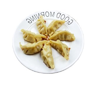 Vente en gros de boulettes d'aliments surgelés Gyoza de poulet d'usine en Chine délicieux épicé et salé pour le petit déjeuner des adultes et des enfants - Product Image 1