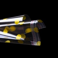 Vente en gros bon marché scellant les emballages transparents en OPP BOPP avec des points blancs le plus grand rouleau de film feuilles de plastique rouleau de films pour les aliments