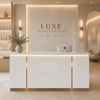 Comptoir de réception de salon personnalisé en MDF de luxe avec éclairage LED et design durable pour utilisation commerciale à l'accueil