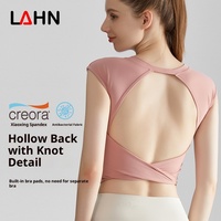 Camiseta sin mangas para yoga con almohadillas de sujetador integradas, de largo completo, que cubre el abdomen, de alta resistencia a impactos y con diseño trasero que realza la figura.