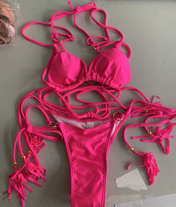 Conjunto de bikini de dos piezas para mujer con detalles de borlas, top cruzado tipo halter y braguita con lazo lateral, traje de baño de punto elástico de color sólido - Product Image 4