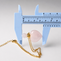 Vente en gros de pendentifs en forme de cœur en cristal naturel brut, flacon de parfum en jade en forme de cœur, flacon d'huile essentielle parfumée, collier