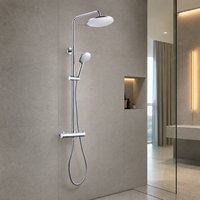 Ensemble de douche pluie rond en chrome poli avec mitigeur en laiton, fixation murale et douchette à main sur barre coulissante