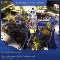 Construction d'un grand modèle de toboggan en acier inoxydable dans une tour de divertissement non motorisée dans un parc d'attractions la nuit