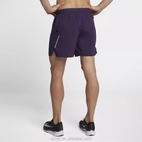 Shorts de sport en maille, fabrication OEM en Chine, shorts de course personnalisés avec bande réfléchissante