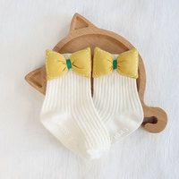 Chaussettes personnalisées unisexes mignonnes pour enfants avec nœud noir et rose motif dessin animé chaussettes respirantes et antidérapantes pour nouveau-né 0-3 ans