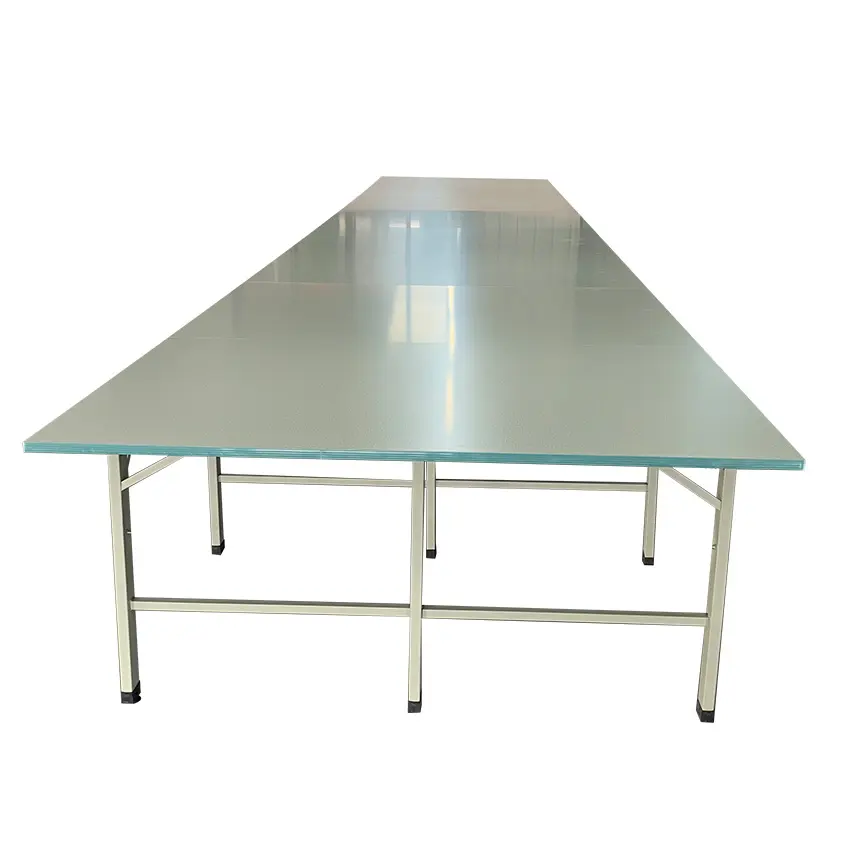 Table de découpe en tissu et planche de table de pavé usine de vêtements établi de machine à rainurer en tissu automatique