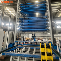 Tour de stockage automatique de plaques d'acier de haute précision, rayonnage intelligent avec manipulateur intégré pour atelier laser