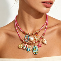 Collier double couche en cordon tressé rose avec pendentif coquillage, étoile de mer et perle peinte, style bohème, fait main pour femme