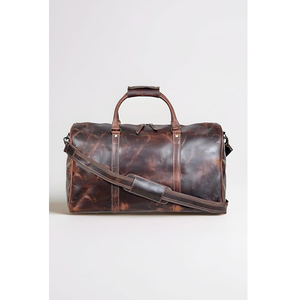 Portez avec confiance vos essentiels : ce sac de sport en cuir véritable à 100 %, conçu en polyester pour une stabilité et un confort optimaux en voyage. - Product Image 5