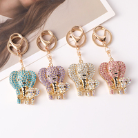 Porte-clés élégant et créatif en forme d'éléphant avec diamants et strass, pendentif pour clés de voiture, cadeau souvenir en métal tendance