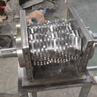 Machine industrielle de broyage d'os en acier inoxydable haute performance pour la production de pâte de bœuf, de poulet, de poisson et d'aliments pour animaux de compagnie
