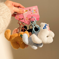 Nouveau porte-clés chien en peluche avec lunettes et cœur, design original, pour décoration de sac à dos