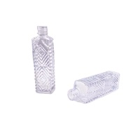 Desain Baru Pabrik Zibo 10Ml Botol Kaca Parfum Bening Ukiran Bunga dengan Tutup Penyemprot