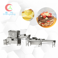 Machine automatique Shengxing pour la fabrication de crêpes aux œufs, de gâteaux mille-feuilles et de galettes